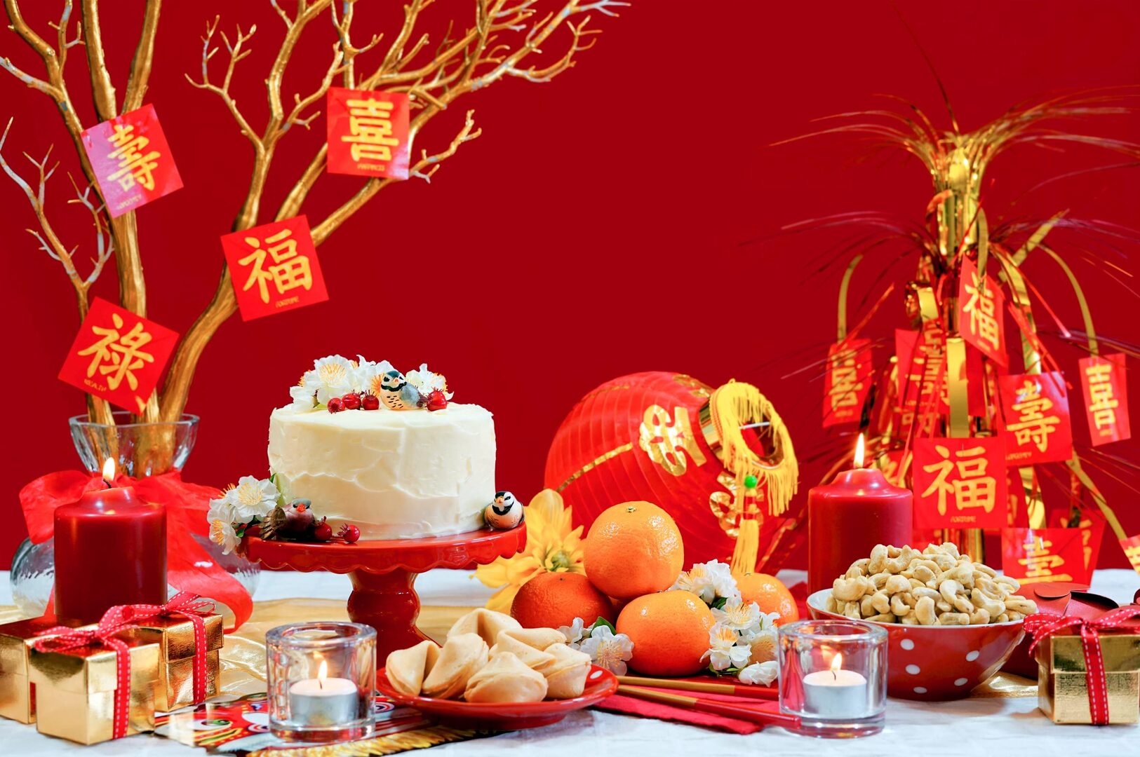 A festive display of Chinese New Year decorations at home, showcasing red lanterns, couplets, and auspicious symbols.