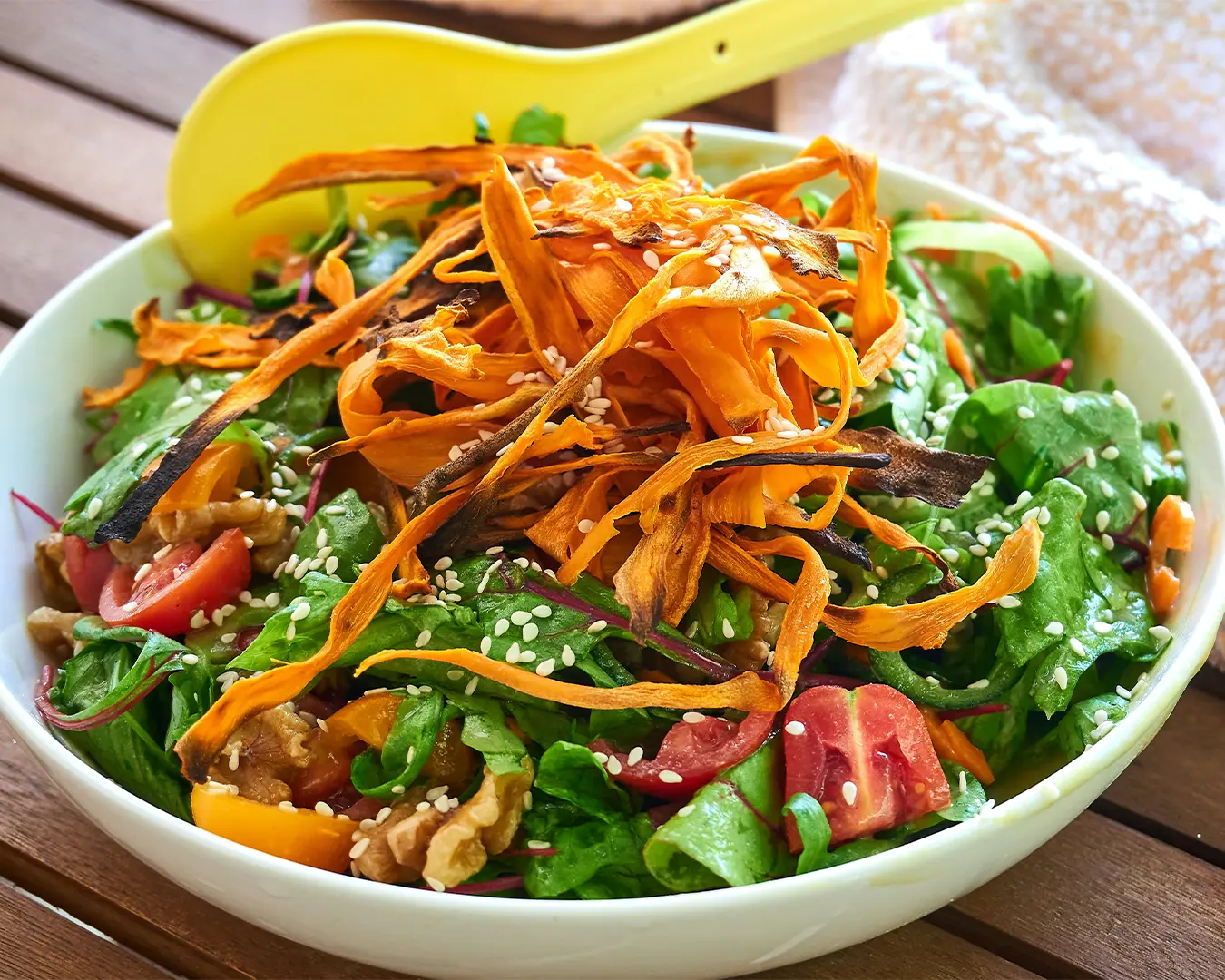 An appetising plate of vegetarian cuisine, featuring a vibrant mix of seasonal vegetables, grains, and garnishes, arranged to highlight freshness and variety.
