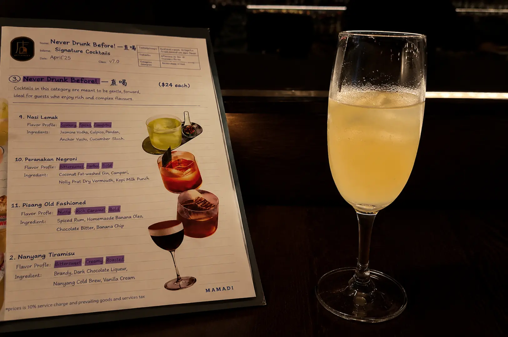 Signature cocktail menu displayed beside a refreshing bespoke cocktail, showcasing creative drinks inspired by local flavours