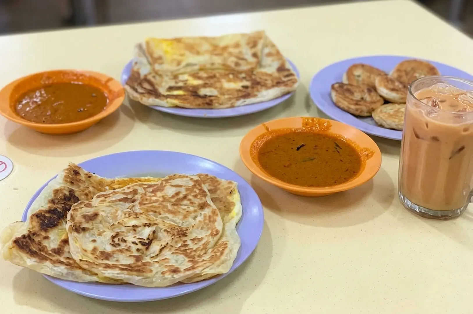Roti Prata with curry and Teh Tarik