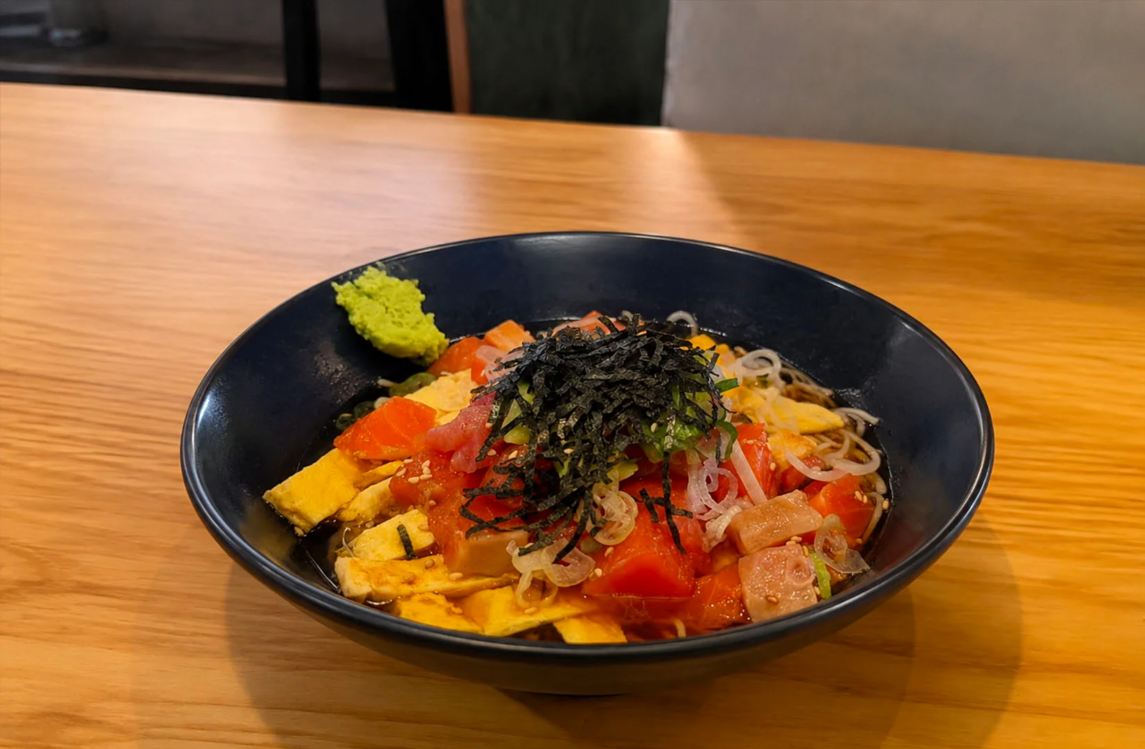 Fresh salmon soba bowl at Healthy Soba Iki Singapore with Japanese-inspired ingredients.