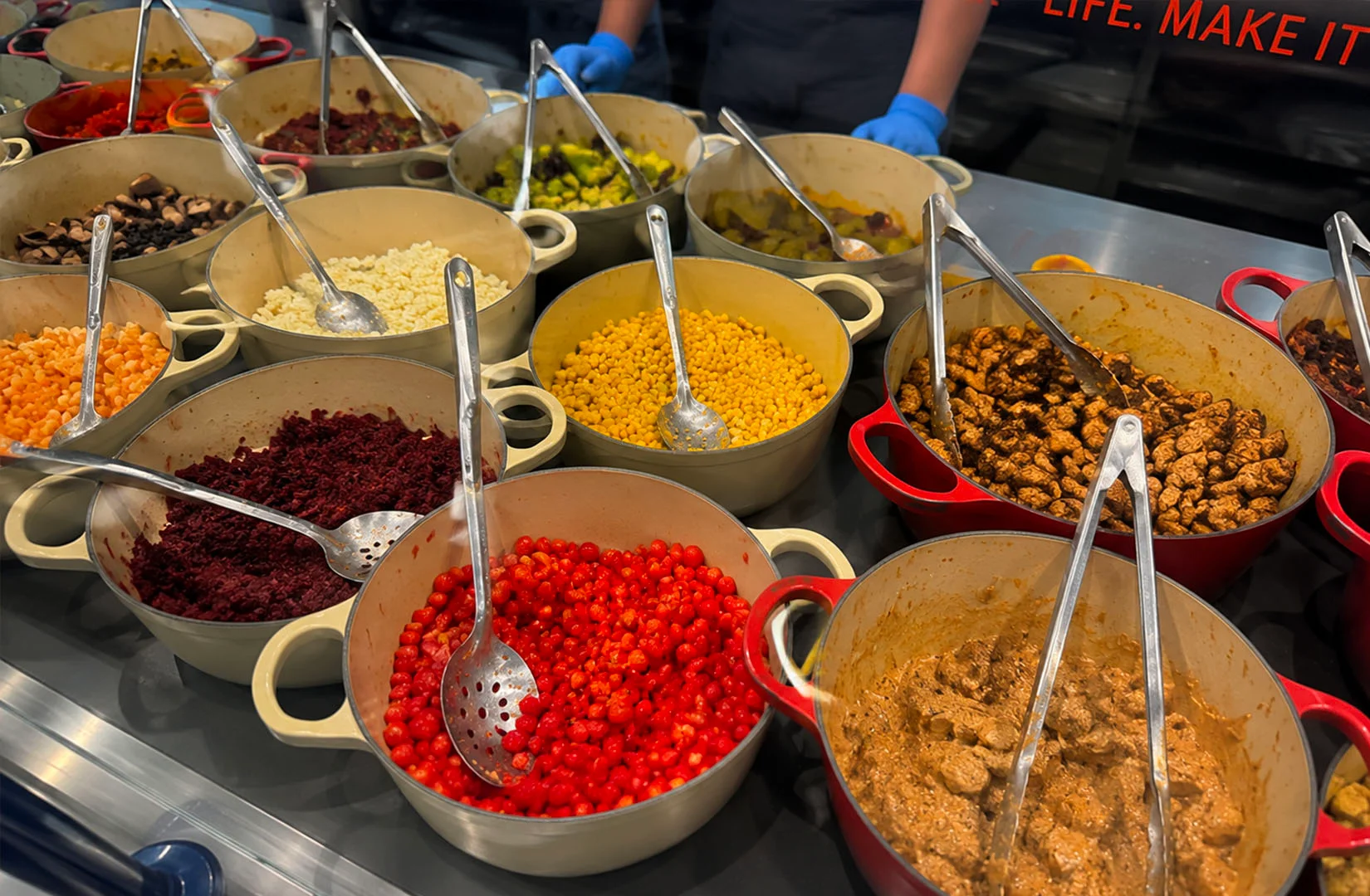 Healthy salad bar ingredients and fresh meal options at The Daily Cut Raffles Place.