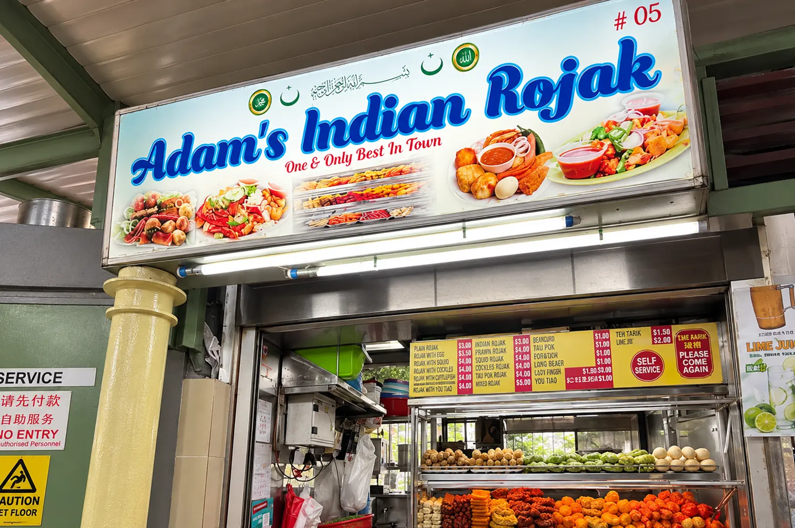 Adam's Indian Rojak stall displaying its colorful selection of rojak ingredients and menu options.