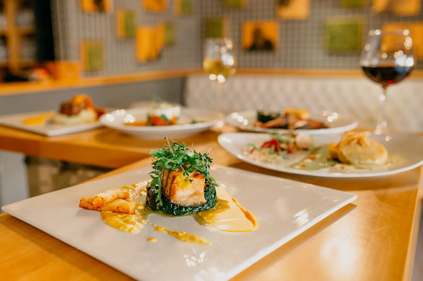 A beautifully plated gourmet dish served in an upscale restaurant, showcasing refined presentation and culinary artistry.